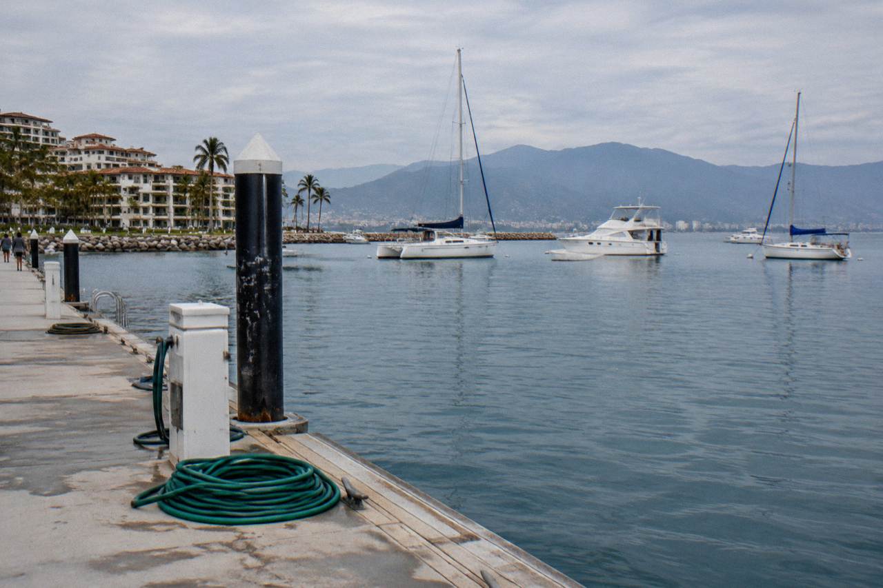 Calm blue water of Banderas Bay with tour boats at anchor near Puerto Vallarta