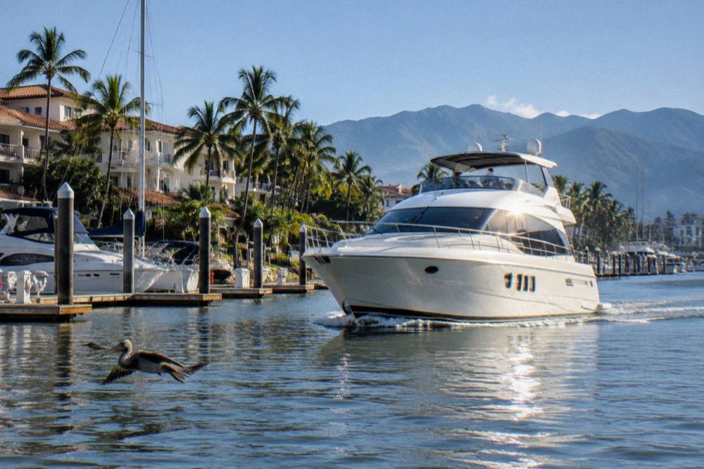 A private charter boat cruising on open water in Banderas Bay